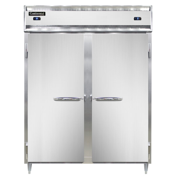 A white rectangular Continental refrigerator/freezer with stainless steel double doors open.
