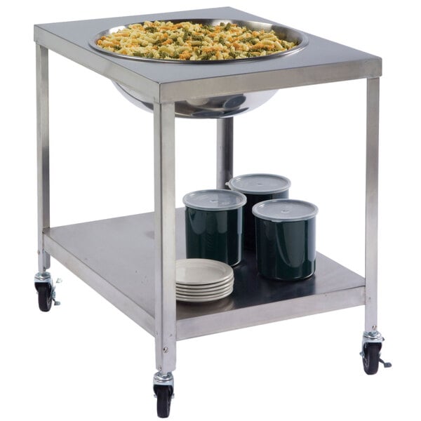 A Lakeside stainless steel mobile mixing bowl stand with a large metal bowl of food on it.