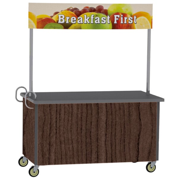 A Lakeside stainless steel vending cart with a walnut laminate finish and a fruit sign on it.