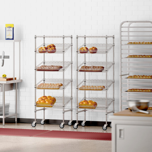A Regency chrome wire shelving rack holding baking pans and racks in a kitchen.