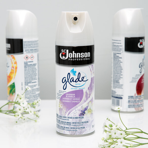 A close-up of a white SC Johnson Glade air freshener spray can.