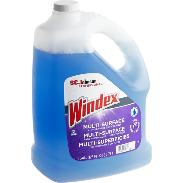 A jug of SC Johnson Windex non-ammoniated multi surface cleaner with a blue label and liquid.