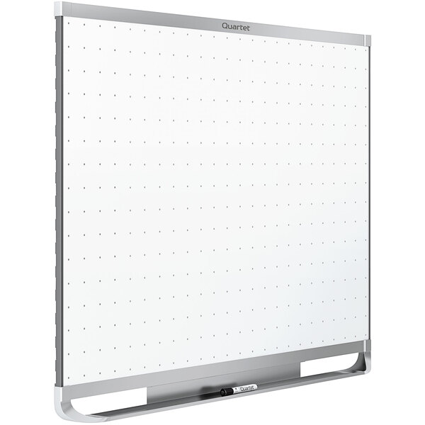 A Quartet Total Erase whiteboard with a grid on it.