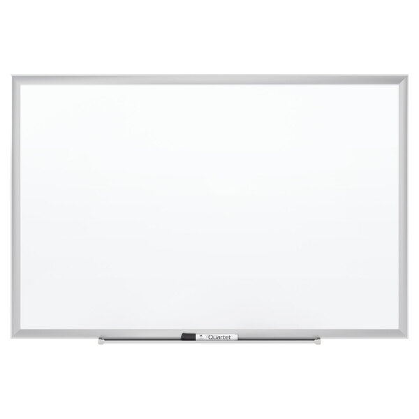 A Quartet white board with a silver frame.
