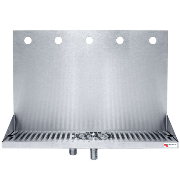 A stainless steel metal plate with holes for 5 faucets.