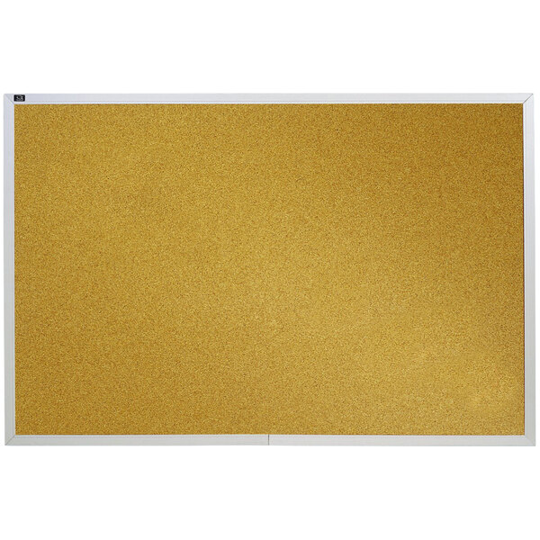 A cork board with a white frame.