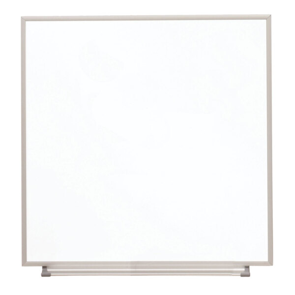 A Quartet whiteboard with a metal frame.