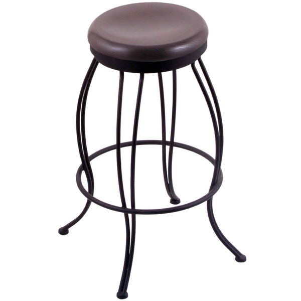 A Holland Bar Stool black steel swivel stool with a dark cherry oak seat.