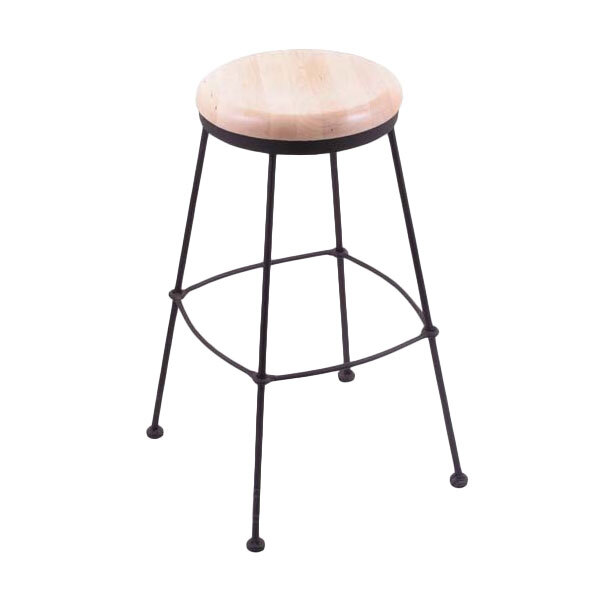 A Holland Bar Stool black wrinkle steel counter height stool with natural maple wood seat.