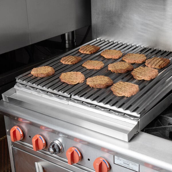 Hamburger patties cooking on a 24" Add-On Charbroiler.