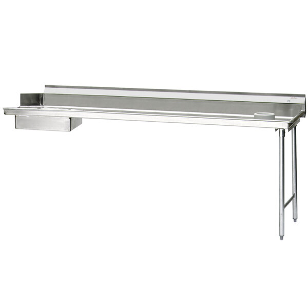 An Eagle Group stainless steel dishtable with a scrap block on a counter.