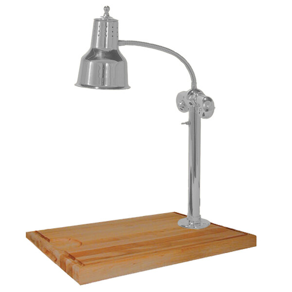 A stainless steel Hanson Heat Lamp on a maple wood table.