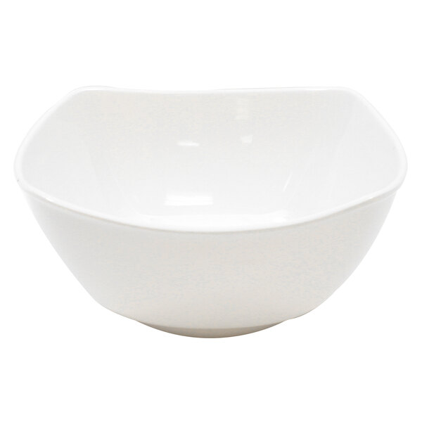 A white Tablecraft wavy melamine bowl.