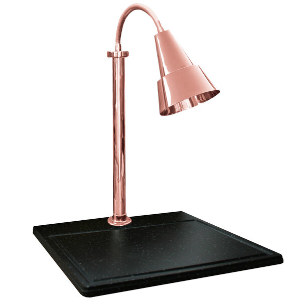 A Hanson Heat Lamps copper lamp on a black rectangular surface.