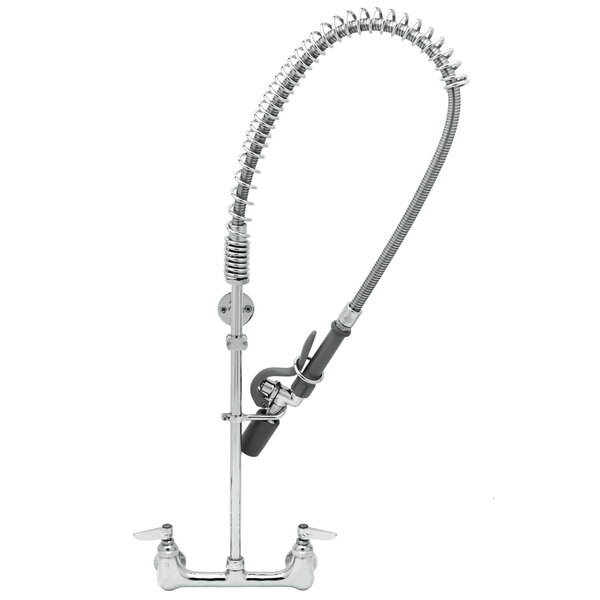 A T&S chrome wall mounted pre-rinse faucet with a curved hose.