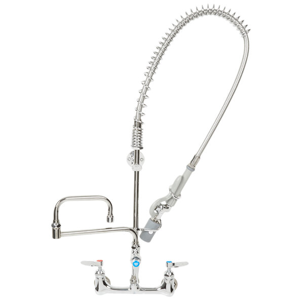 A silver T&S wall mounted pre-rinse faucet with a curved hose.