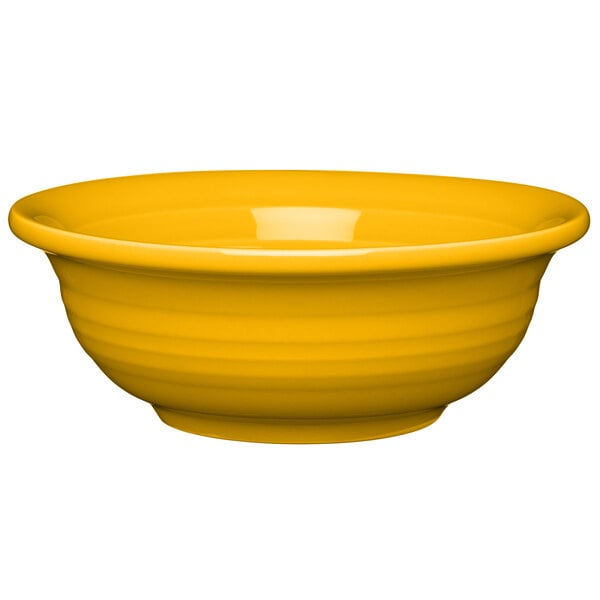 A yellow Fiesta china bowl with a white interior.