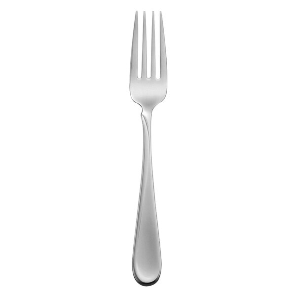 A silver fork with curved designs on the handle.