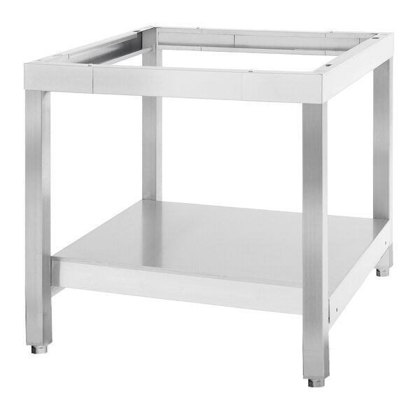 A Garland stainless steel equipment stand with a shelf on top.