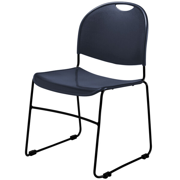 A navy blue plastic stacking chair with a black metal frame.