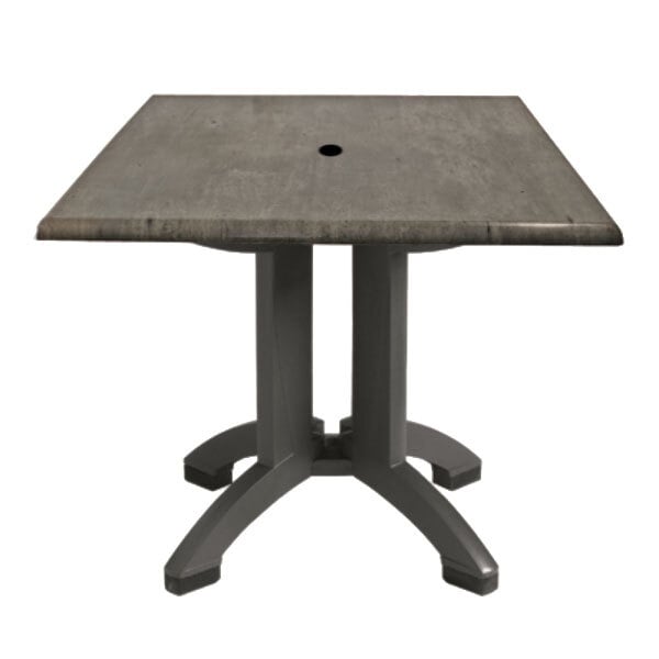 A gray square table with a hole in the top.