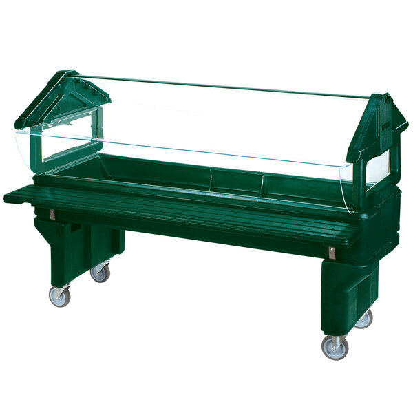 A green food cart with a clear glass top.