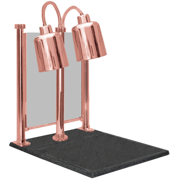 A Hanson Heat Lamps bright copper carving station with dual lamps over a black counter.