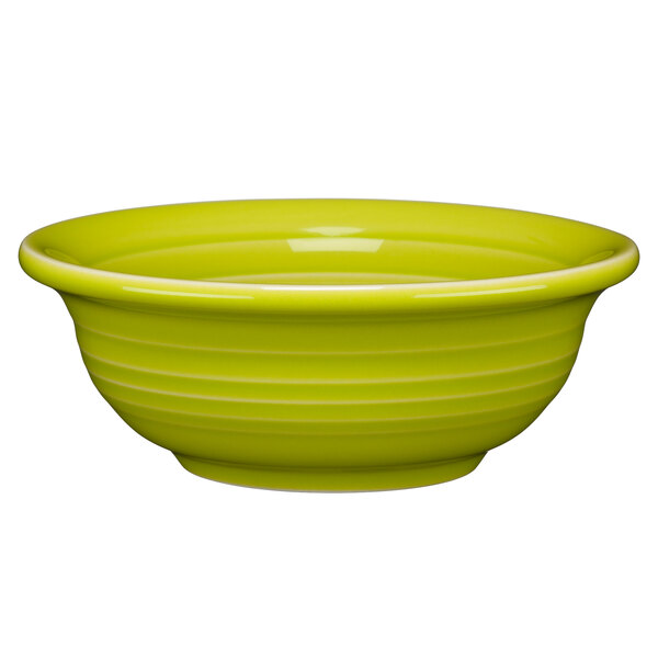 A close up of a yellow Fiesta bowl with a white background.