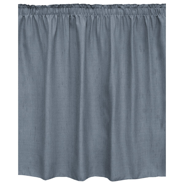 A slate blue Snap Drape table skirt with ruffled edges.