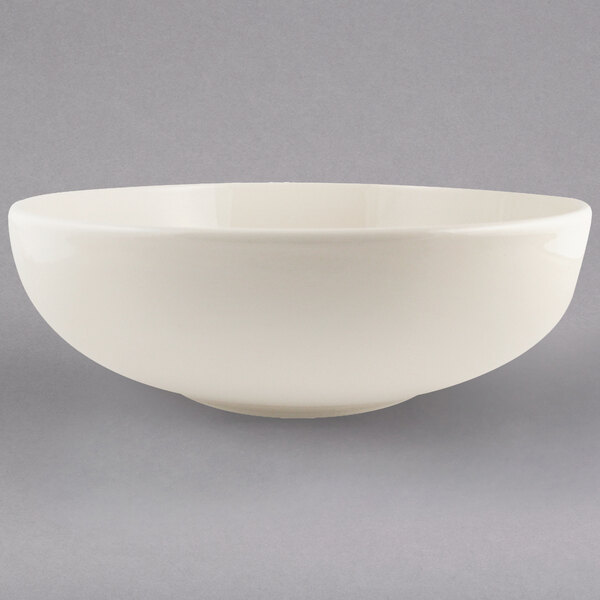 A Homer Laughlin ivory china bistro bowl with a small rim on a white background.