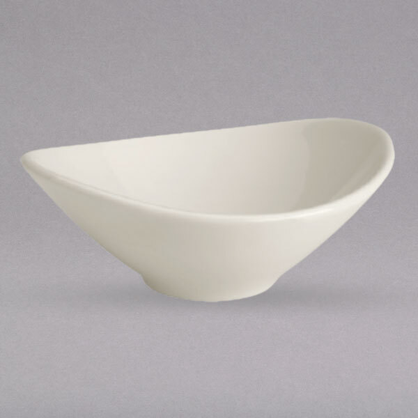 A Homer Laughlin Unique Ivory china bowl with a curved edge.
