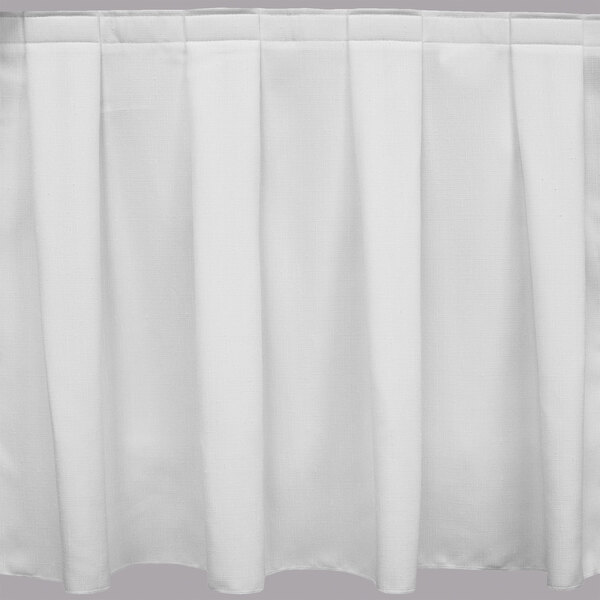 A white Snap Drape box pleat table skirt with three pleats.