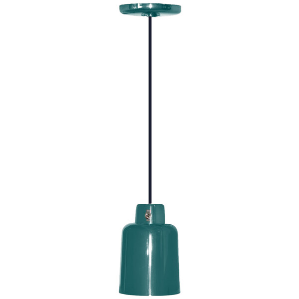 A Hanson Heat Lamps ceiling mount heat lamp with a verdigris finish hanging from a black cord over a table.