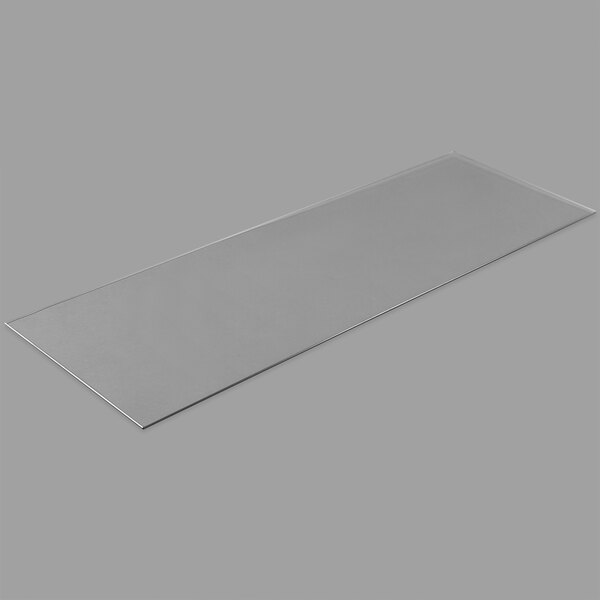 A rectangular glass shelf with a metal frame.
