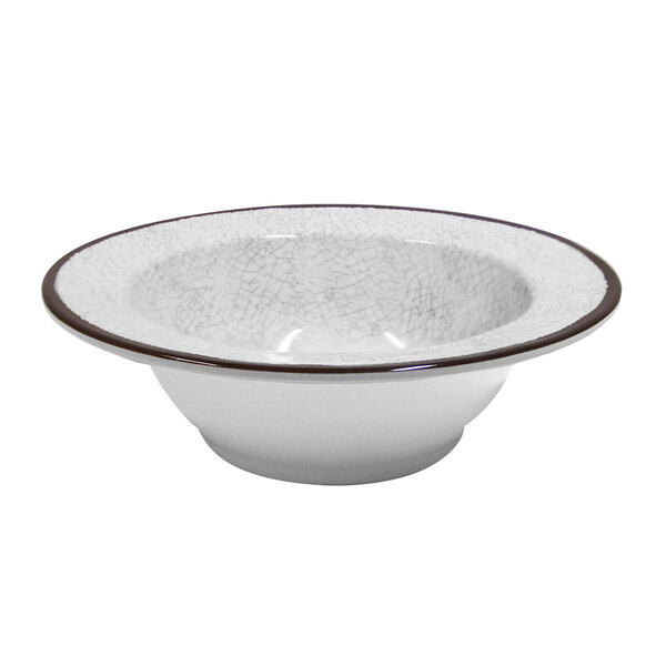 A white melamine bowl with a black speckled rim.