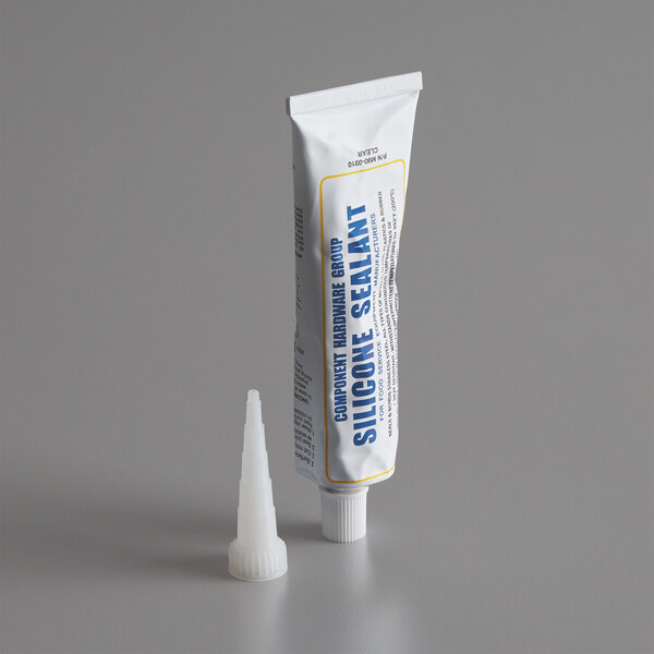 A tube of FMP clear silicone sealant on a white surface.
