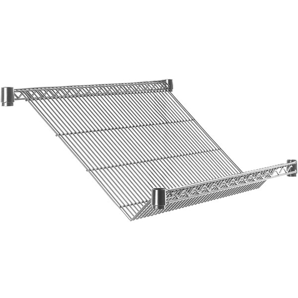 A Metro Super Erecta stainless steel slanted shelf with a metal rack.