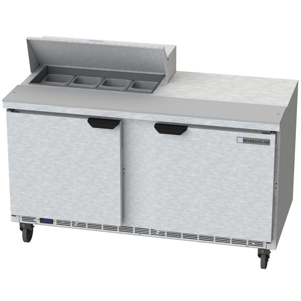 A white Beverage-Air commercial refrigerator with two doors and two drawers on a counter.