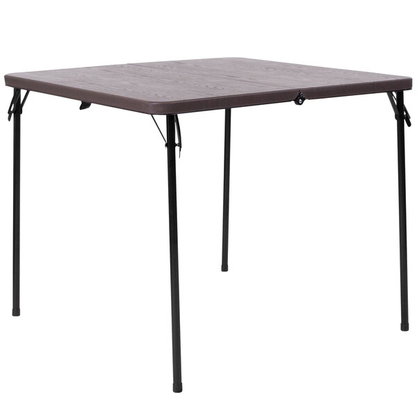 A Flash Furniture brown square plastic folding table with metal legs.