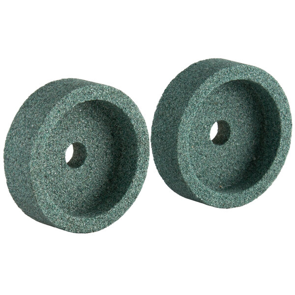 Two circular green Avantco coarse sharpening wheels with a hole in the center.