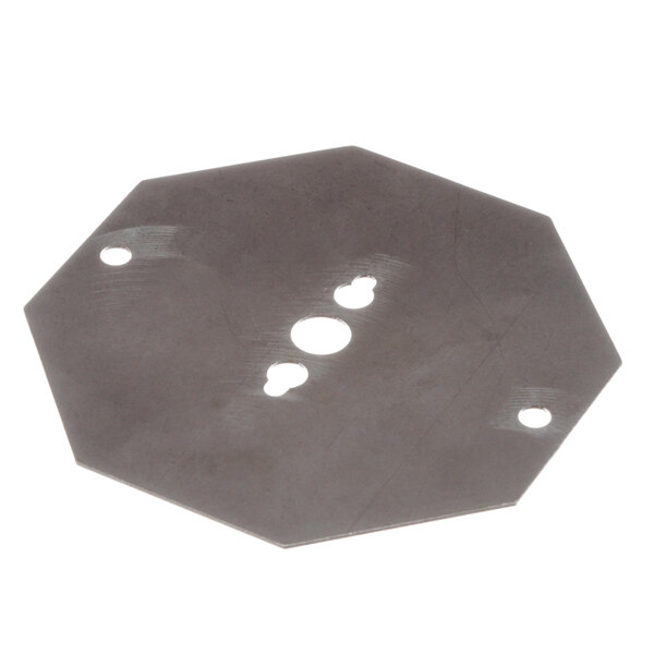 A black hexagon shaped metal plate with holes.