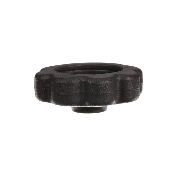 A black plastic knob with a round center and a black rubber ring with a hole inside.