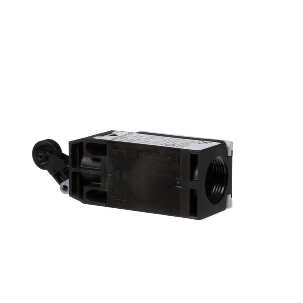 A black rectangular plastic switch with holes and a white label.