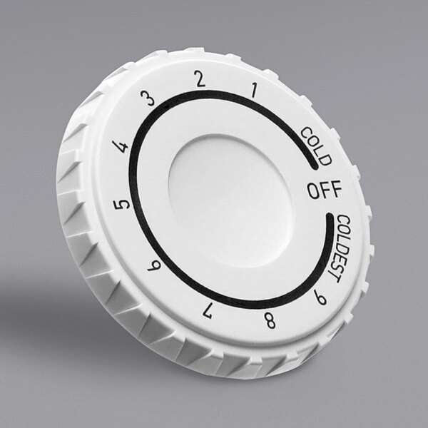A white Arctic Air knob with black text and numbers.