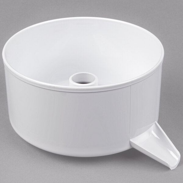 A white bowl with a handle for a juicer.