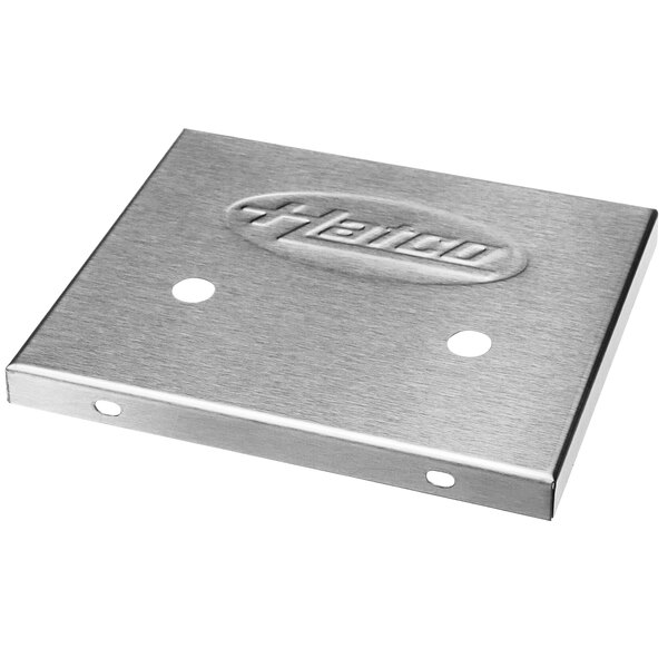 A stainless steel Hatco indicator light cover with 2 holes.
