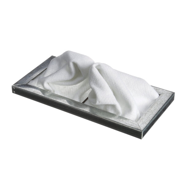 A white tissue paper in a metal box.