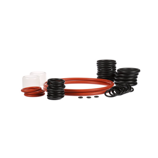 A stack of black and red round rubber seals and O-rings.