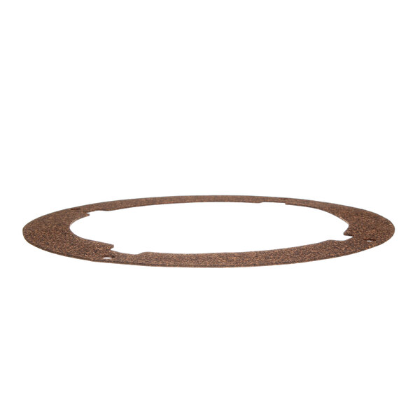 A brown circular metal gasket with a circle cut out.