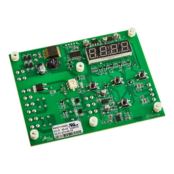 A green Hatco circuit board with white and black components.